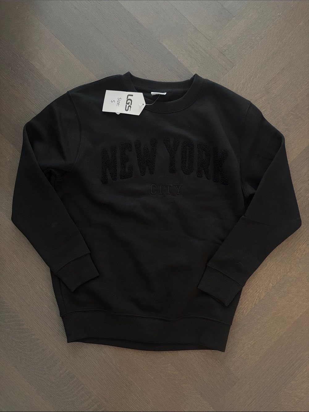 New York city Black Crewneck Sweatshirt with 'New York City' Embossed